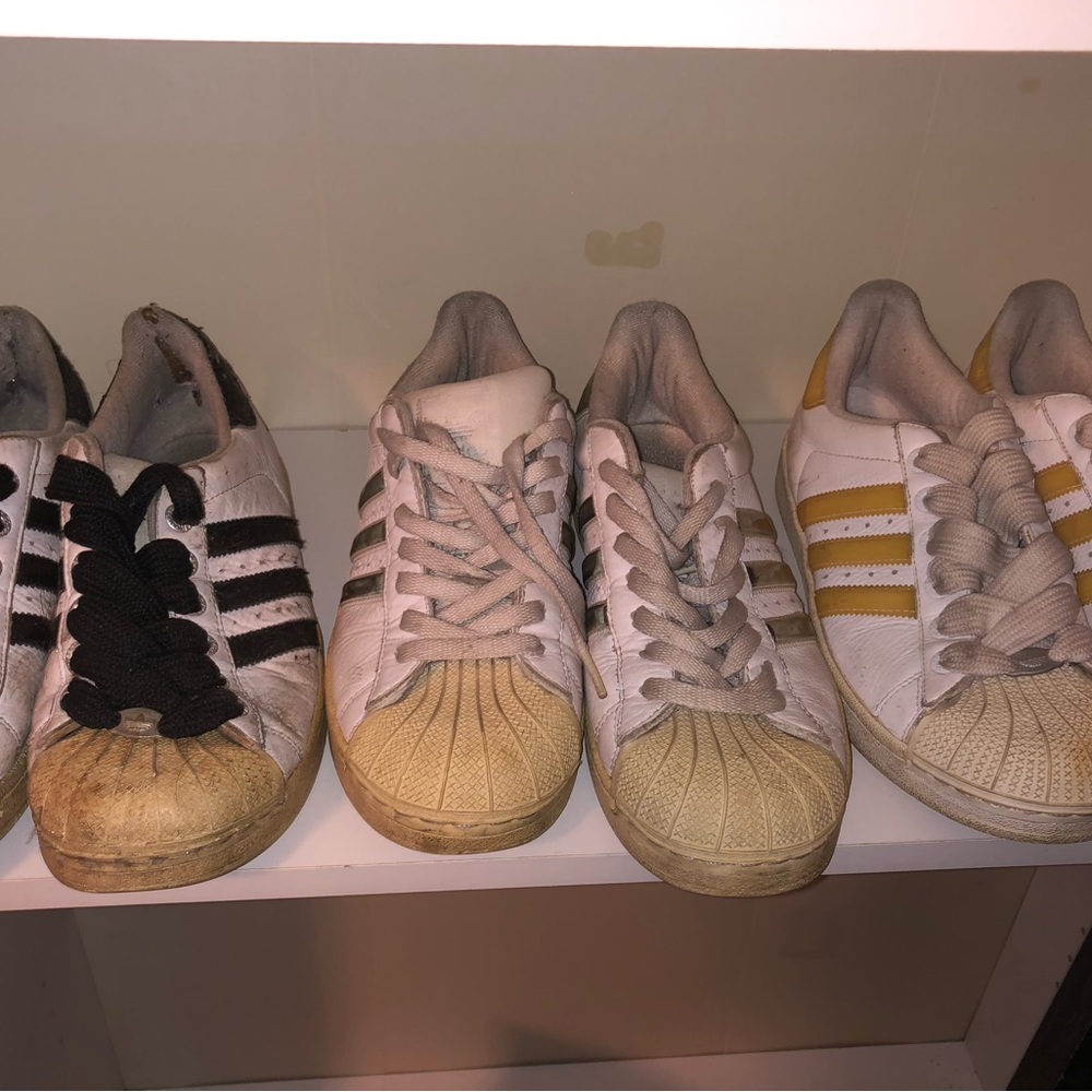 3 pairs of Adidas size 7, 7.5 and 8.5.